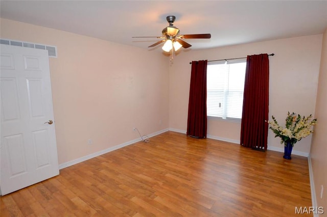 936 Palamino Path, High Ridge, MO 63049 - empty room with ceiling fan, light wood-type flooring, and baseboards