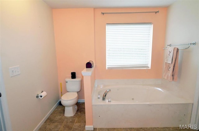 936 Palamino Path, High Ridge, MO 63049 - full bathroom featuring toilet, a jetted tub, tile patterned floors, and baseboards