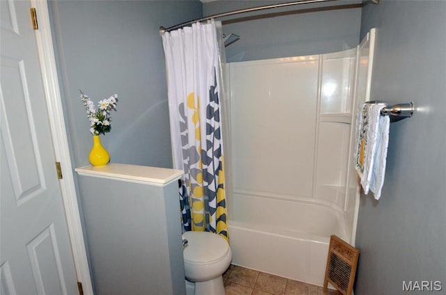 936 Palamino Path, High Ridge, MO 63049 - full bath featuring shower / bath combo, toilet, and tile patterned flooring
