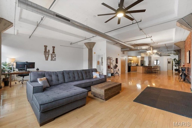 1619 Washington Ave Unit 805, Saint Louis, MO 63103 - living area featuring a desk, a ceiling fan, and wood-type flooring