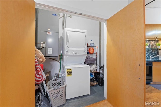 1619 Washington Ave Unit 805, Saint Louis, MO 63103 - laundry room with estacked washer and dryer and heating unit