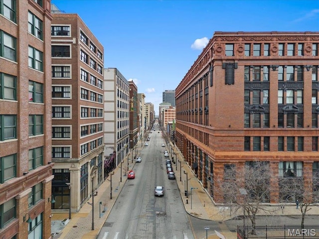 1619 Washington Ave Unit 805, Saint Louis, MO 63103 - view of asphalt road with sidewalks and curbs