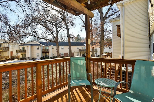 9154 Eager Rd, Saint Louis, MO 63144 - view of wooden balcony with a residential view and a wooden deck