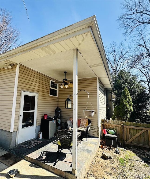 125 Hull Ave, Saint Louis, MO 63119 - view of patio with a ceiling fan and fence