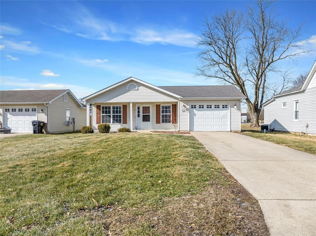 ranch-style home with an attached garage, a front yard, and concrete driveway