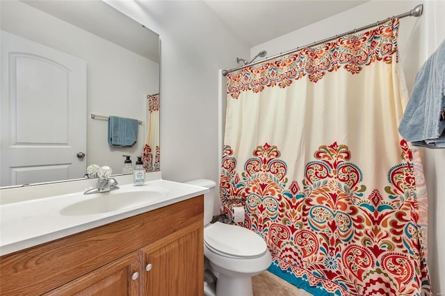 bathroom featuring vanity, toilet, and a shower with curtain