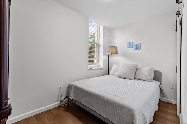 2005 Lynch St Unit C, Saint Louis, MO 63118 - bedroom featuring wood finished floors and baseboards