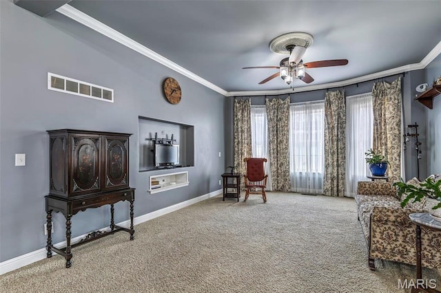 616 W Columbia St, Farmington, MO 63640 - living area featuring crown molding, carpet, and ceiling fan