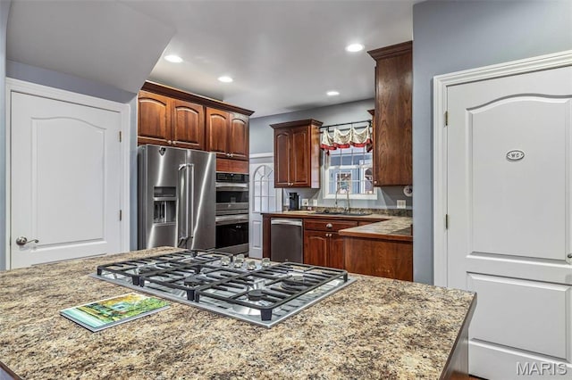 616 W Columbia St, Farmington, MO 63640 - kitchen featuring stainless steel appliances, a kitchen island, and recessed lighting
