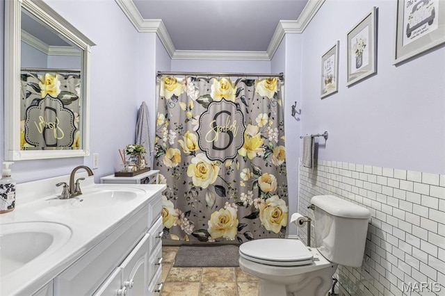 616 W Columbia St, Farmington, MO 63640 - bathroom featuring tile walls, crown molding, double vanity, a shower with shower curtain, and wainscoting