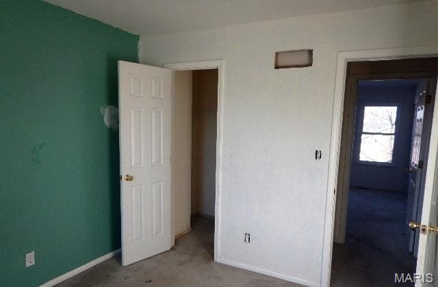 16 Garden Gate Ct, Saint Peters, MO 63304 - unfurnished bedroom featuring carpet floors and baseboards