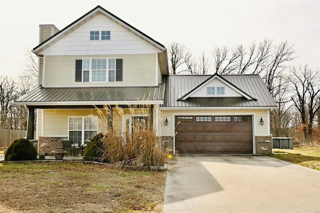 view of front facade featuring brick siding, covered porch, an attached garage, and driveway