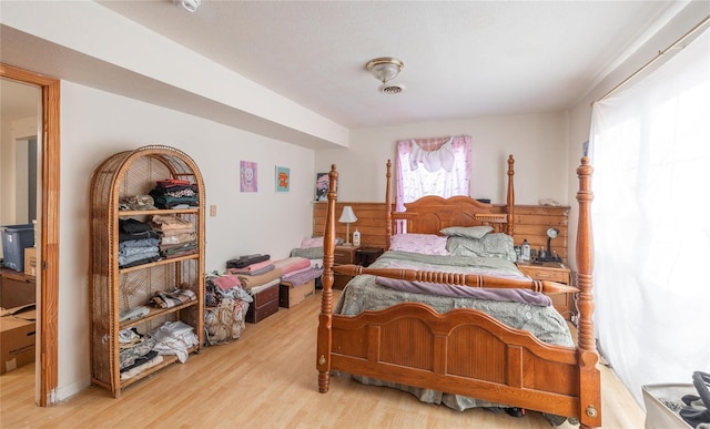 20020 Buffer Ln, Waynesville, MO 65583 - bedroom with light wood finished floors