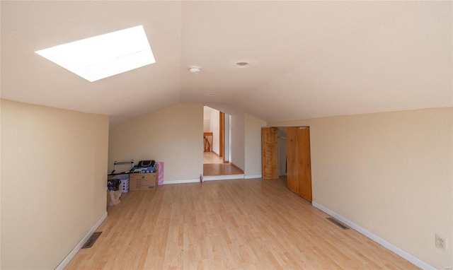 20020 Buffer Ln, Waynesville, MO 65583 - additional living space featuring a skylight, light wood finished floors, lofted ceiling, and baseboards