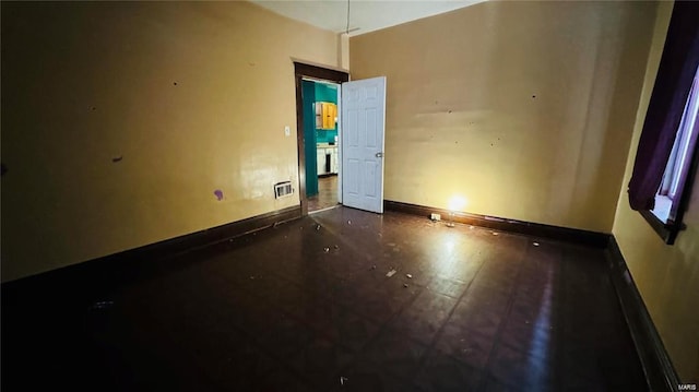 3449 Miami St, Saint Louis, MO 63118 - unfurnished room with baseboards and tile patterned floors