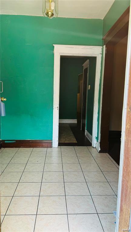 3449 Miami St, Saint Louis, MO 63118 - empty room featuring light tile patterned floors