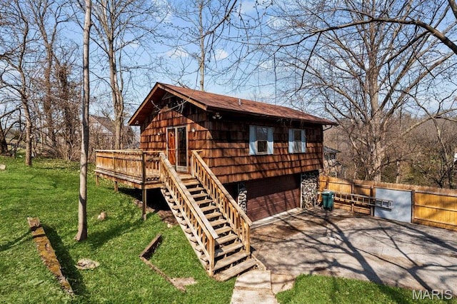 2013 Lily Ave, Saint Louis, MO 63122 - view of front facade featuring driveway, a wooden deck, and stairway