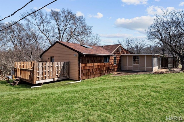 2013 Lily Ave, Saint Louis, MO 63122 - back of house with a wooden deck