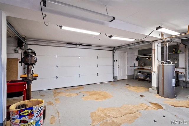 2013 Lily Ave, Saint Louis, MO 63122 - garage featuring electric water heater