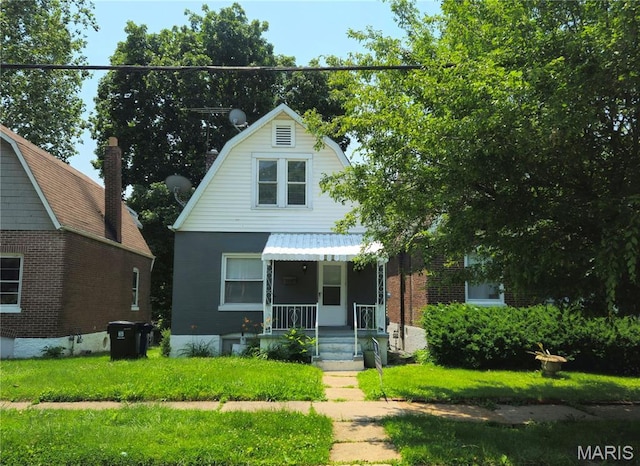 6522 Bartmer, University City, MO 63130 - dutch colonial with a gambrel roof and covered porch