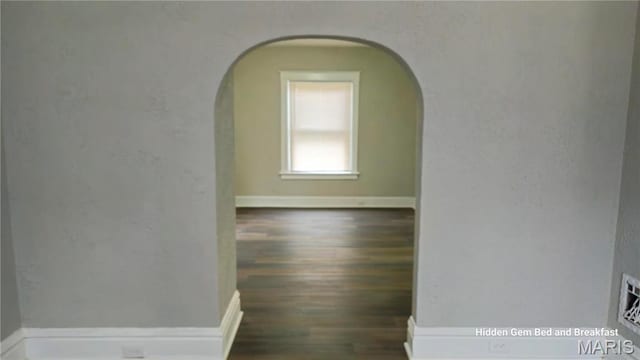 6522 Bartmer, University City, MO 63130 - corridor with arched walkways and wood finished floors