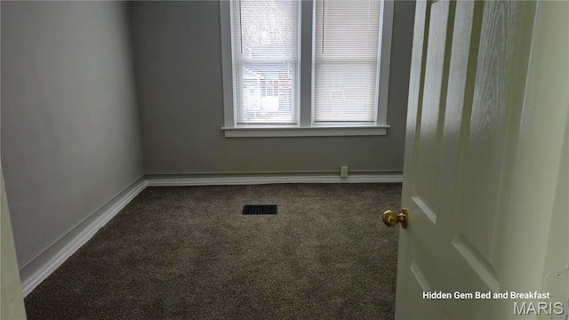6522 Bartmer, University City, MO 63130 - carpeted spare room featuring baseboards