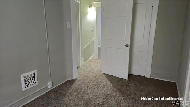 6522 Bartmer, University City, MO 63130 - unfurnished bedroom featuring dark colored carpet