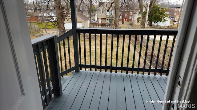 6522 Bartmer, University City, MO 63130 - deck featuring a residential view and a garage