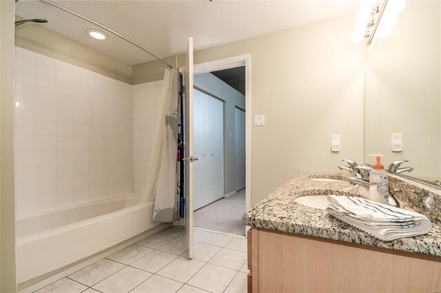 bathroom with tile patterned flooring, shower / tub combo, double vanity, and recessed lighting