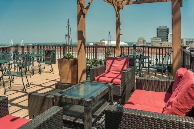 view of patio / terrace with a pergola and a deck