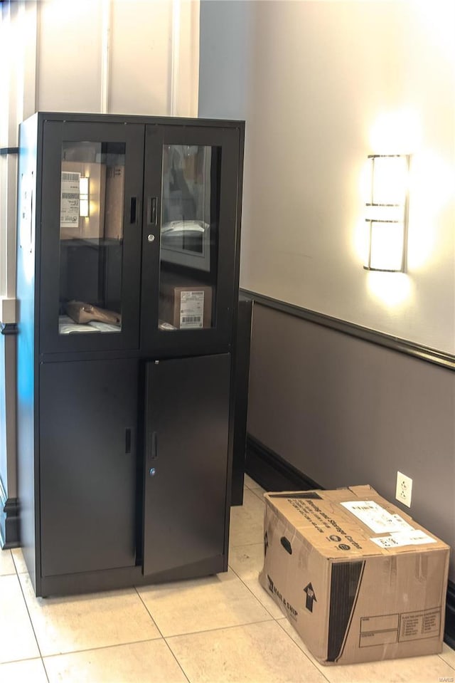 foyer entrance with light tile patterned floors