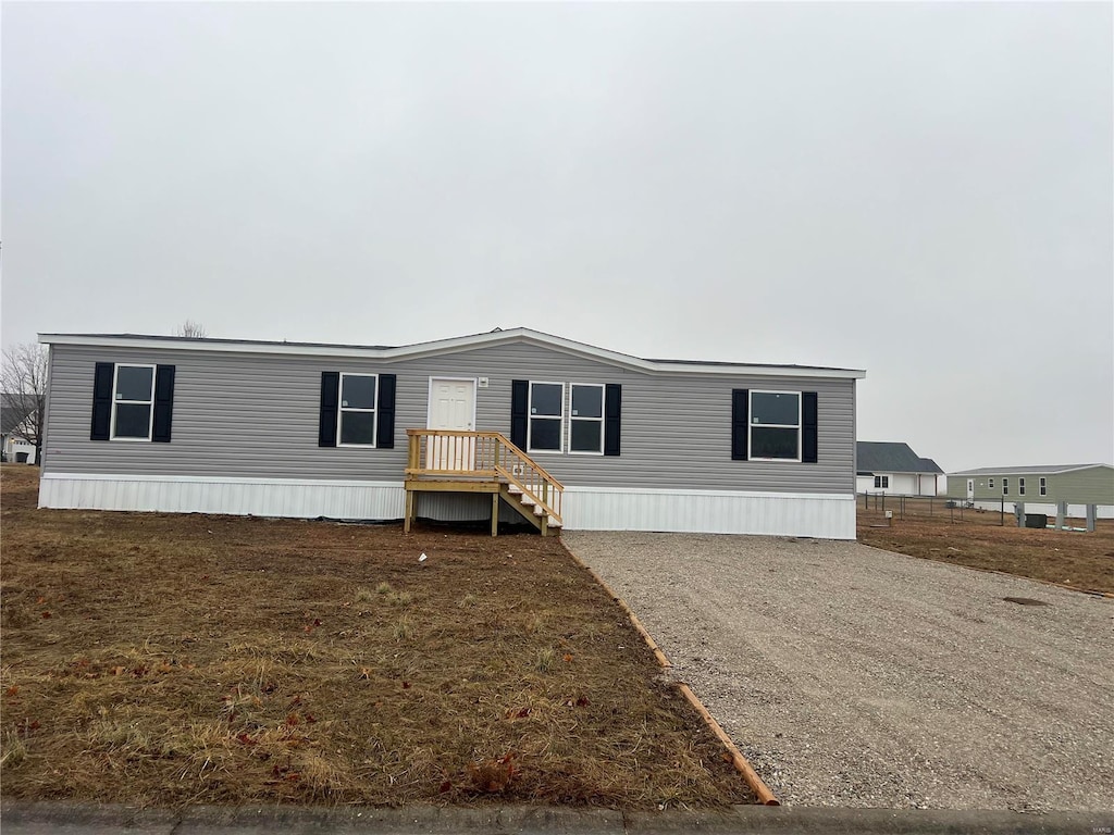 18545 Olivia, Lebanon, MO 65536 - manufactured / mobile home with gravel driveway
