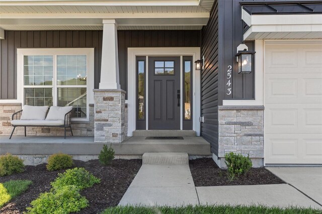 2543 Chukka Dr, Eureka, MO 63025 - entrance to property with stone siding and a porch