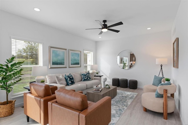 2543 Chukka Dr, Eureka, MO 63025 - living area with healthy amount of natural light, ceiling fan, wood finished floors, and recessed lighting