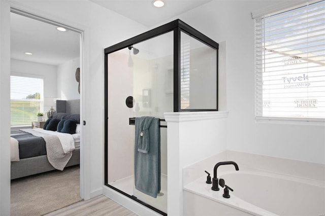 2543 Chukka Dr, Eureka, MO 63025 - ensuite bathroom with a garden tub, a stall shower, healthy amount of natural light, and recessed lighting