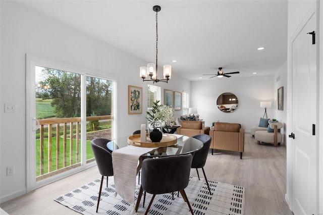 2543 Chukka Dr, Eureka, MO 63025 - dining space featuring light wood finished floors, recessed lighting, a ceiling fan, a chandelier, and baseboards