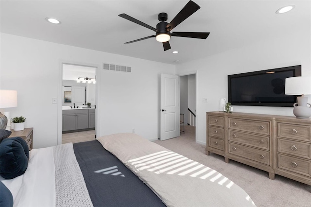 2543 Chukka Dr, Eureka, MO 63025 - bedroom featuring a sink, recessed lighting, ensuite bathroom, light carpet, and ceiling fan