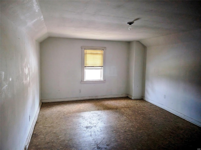 700 Pershing St E, St Louis, IL 62203 - additional living space featuring lofted ceiling and baseboards