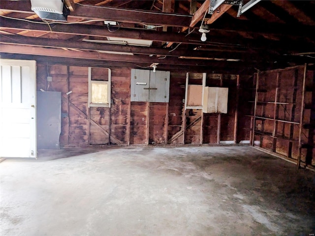700 Pershing St E, St Louis, IL 62203 - garage featuring a garage door opener