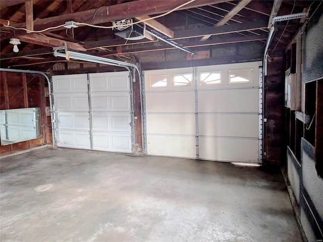 700 Pershing St E, St Louis, IL 62203 - garage featuring a garage door opener