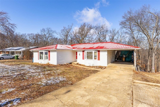 8 Crescent Dr, Viburnum, MO 65566 - ranch-style home with concrete driveway, metal roof, and a carport