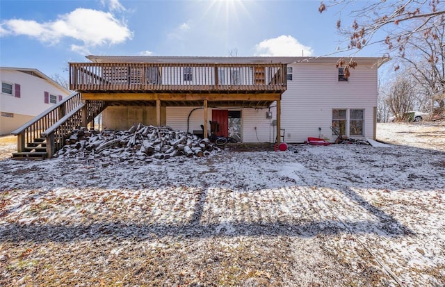 8 Crescent Dr, Viburnum, MO 65566 - snow covered property with a wooden deck and stairway