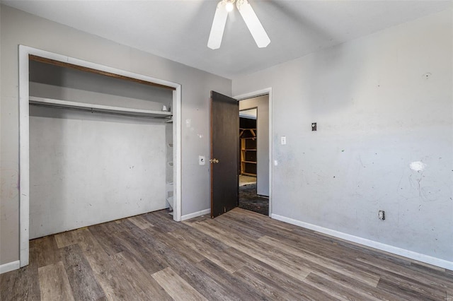 8 Crescent Dr, Viburnum, MO 65566 - unfurnished bedroom with wood finished floors, a closet, ceiling fan, and baseboards