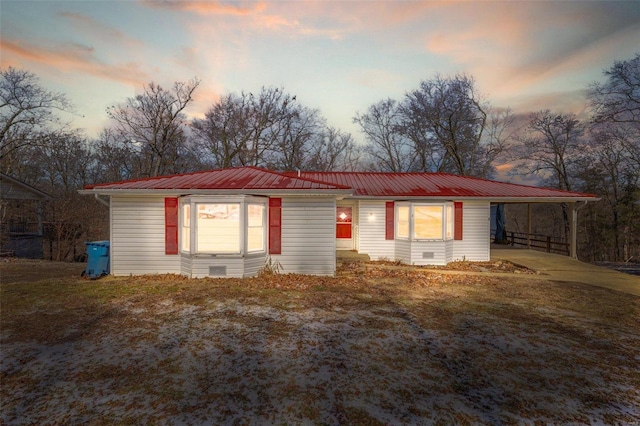 8 Crescent Dr, Viburnum, MO 65566 - ranch-style house with metal roof, an attached carport, and concrete driveway