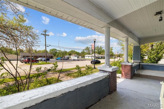 205 W 2nd St N, Wright City, MO 63390 - view of patio / terrace featuring a porch and a residential view