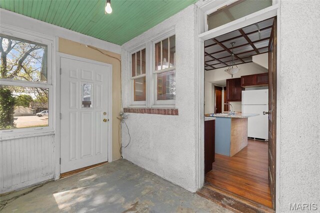 205 W 2nd St N, Wright City, MO 63390 - property entrance with stucco siding
