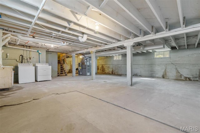 205 W 2nd St N, Wright City, MO 63390 - below grade area with washer and dryer, stairway, and heating unit