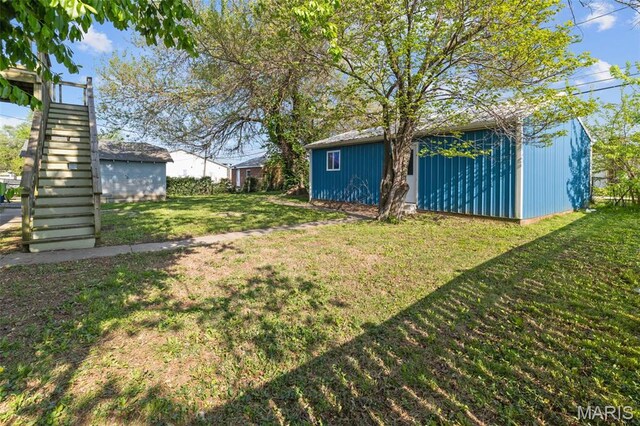 205 W 2nd St N, Wright City, MO 63390 - view of grassy yard featuring an outdoor structure