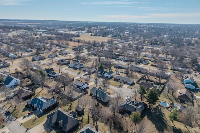aerial view of property's location featuring nearby suburban area