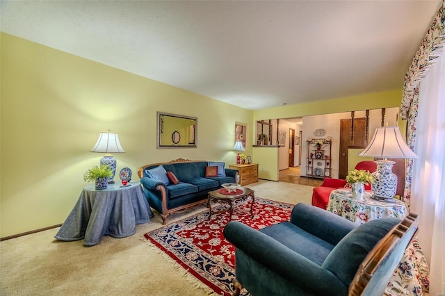 living area featuring carpet